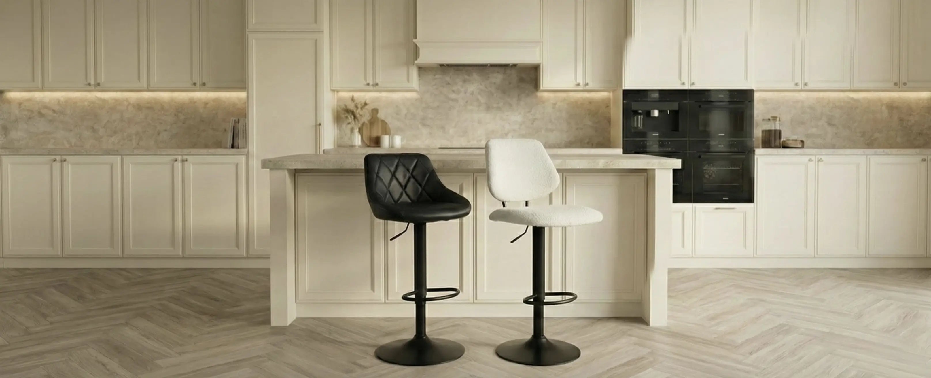 Desktop website banner featuring Furnitura bar stools in a kitchen setting: the Nova model in black and the Orion model in white bouclé fabric.